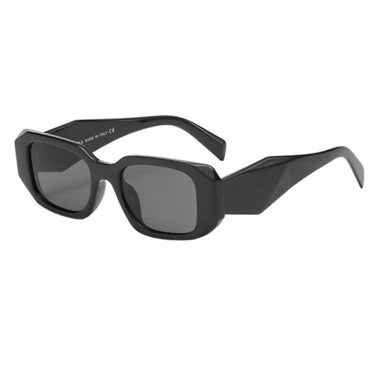 Lentes de sol - Prada.